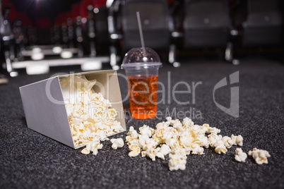 Falling box of pop corn and drink