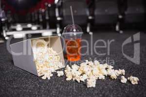 Falling box of pop corn and drink