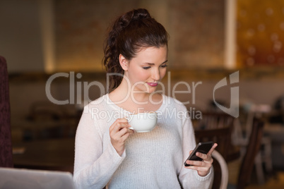 Pretty brunette on the phone