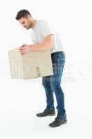 Delivery man picking up cardboard box
