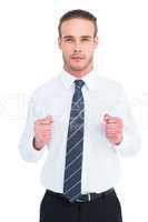 Unsmiling businessman presenting his fists