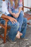 Cute couple sitting on bench