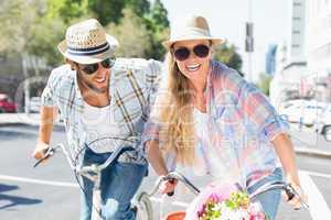 Attractive couple on a bike ride