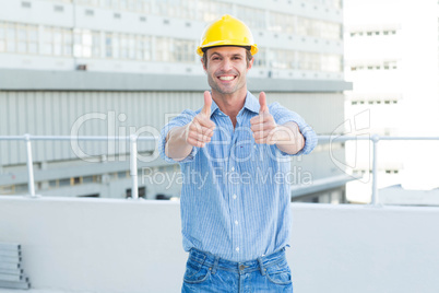 Male architect showing double thumbs up