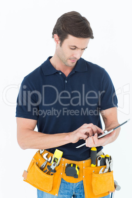 Handyman using digital table over white background