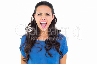 Angry brunette shouting at camera