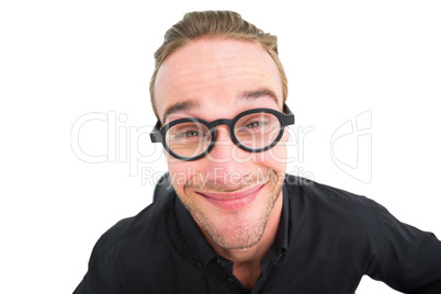 Businessman with reading glasses making a face