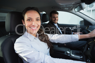 Business team smiling at the camera