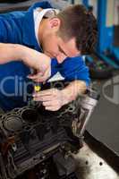 Mechanic working on an engine