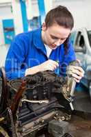 Mechanic working on an engine