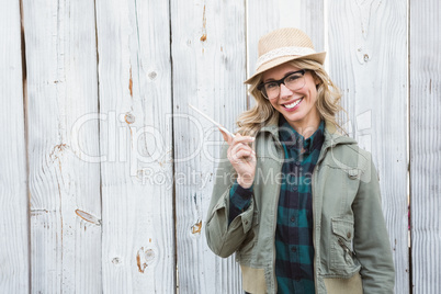Portrait of blonde posing and holding