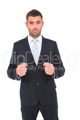 Businessman holding his hands out