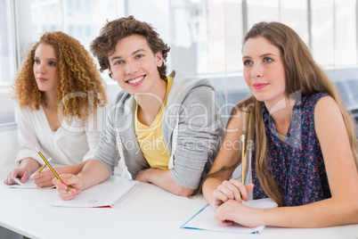 Fashion student smiling at camera