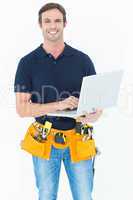 Confident architect using laptop