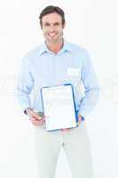 Happy businessman showing blank clipboard