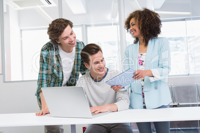 Students working together on tablet pc