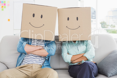 Coworkers with smiling face on couch