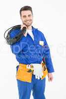 Happy repairman holding cable