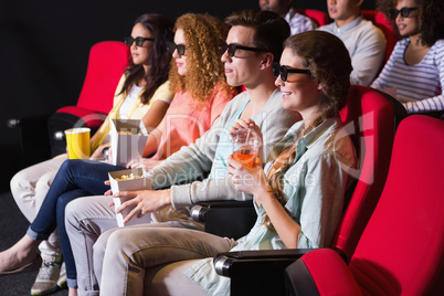 Young friends watching a 3d film