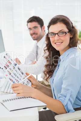 Smiling business coworkers with glasses