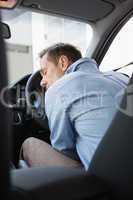 Drunk man slumped on steering wheel