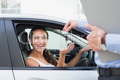 Young woman getting her key