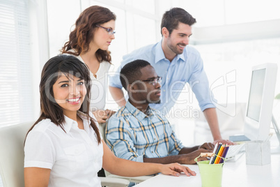 Teamwork using computer monitor together