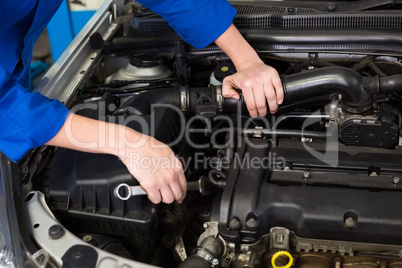 Mechanic working on an engine