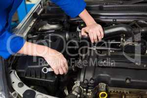 Mechanic working on an engine