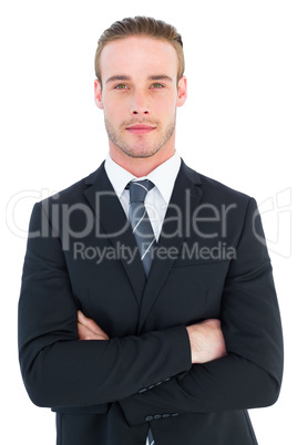 Frowning businessman looking at camera