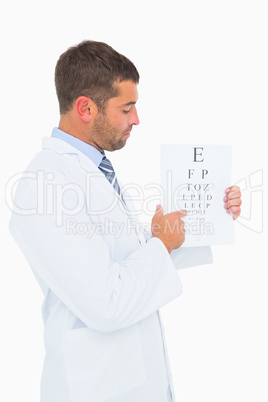 Doctor in lab coast showing eye test