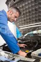 Mechanic working on an engine