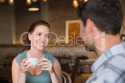 Young couple having coffee together