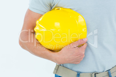 Technician holding hard hat