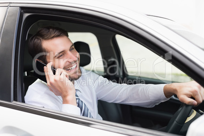 Happy businessman on the phone