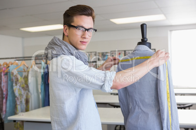 Fashion student working on mannequin