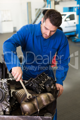 Mechanic working on an engine