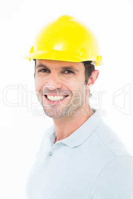 Male architect smiling over white background