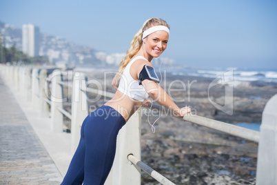Fit blonde listening to music