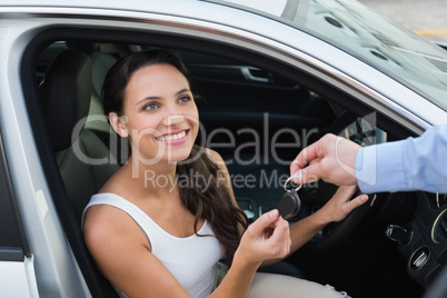 Young woman getting her key