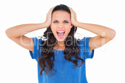 Angry brunette shouting at camera