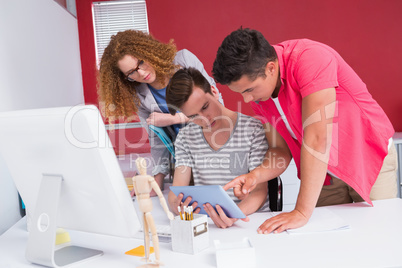 Students working together on tablet pc