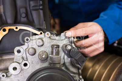 Mechanic working on an engine