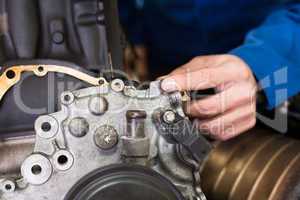 Mechanic working on an engine