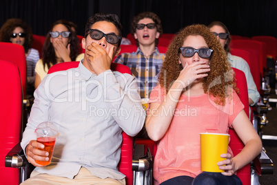 Young friends watching a 3d film