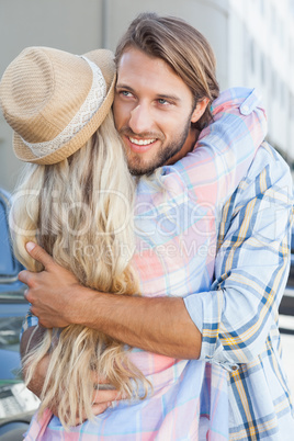 Cute couple standing and hugging