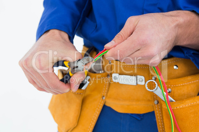 Electrician cutting wires