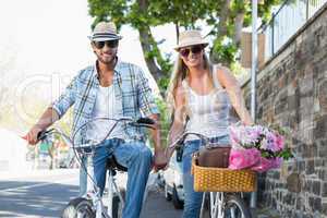 Attractive couple on a bike ride