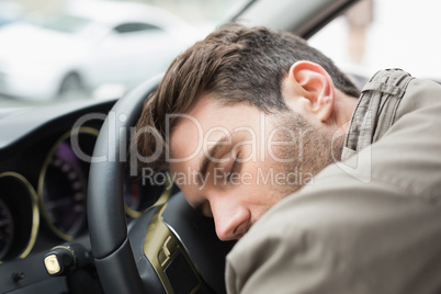 Drunk man slumped on steering wheel