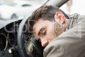 Drunk man slumped on steering wheel